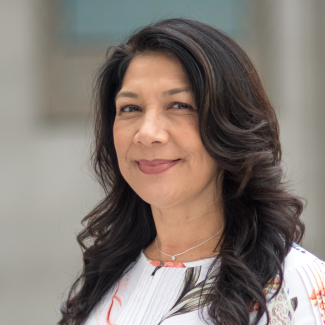 Headshot of Maria Aguiniga, Office Manager.